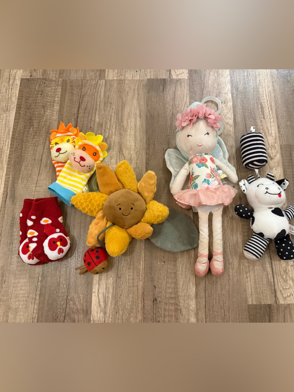 Lot of baby crinkle / rattle toys including a jellycat sunflower toy!